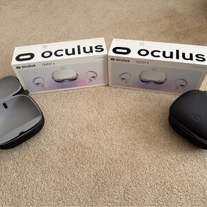 2 Oculus Quest 2 VR Headset - White and Black 64 gb with carrying case for both
